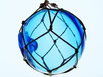 Photograph of a glass window ornament.