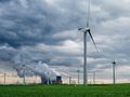  Picture of wind turbines surrounding a coal-fired power plant in western Germany