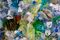 Photograph of a bag of various types and colors of plastic trash