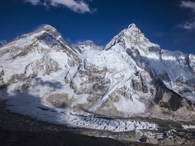 Mount Everest is the highest point on Earth standing at approximately 8,850 meters (29,035 Feet).