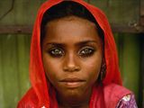 Photo: Portrait of girl with piercing eyes