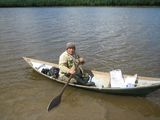 Photo: V. M. Gabov, youngest fluent speaker of Chulym, boating on the Chulym River